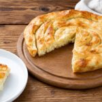 Golden Balkan feta and cream cheese pie made with flaky filo pastry